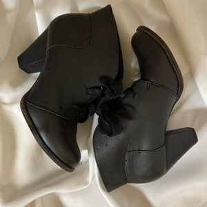 Black heeled lace up booties. Size 7. Gently used.